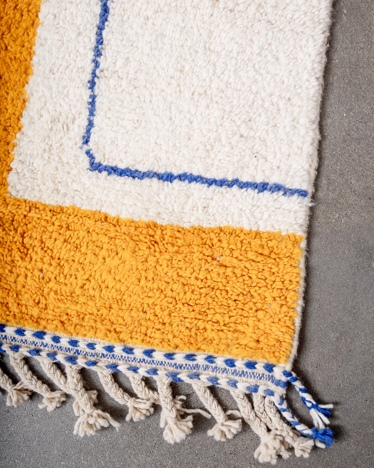 Modern, designer, handcrafted Berber rug from Morocco. Beniourain carpet with beautiful colours and patterns and fluffy wool texture.